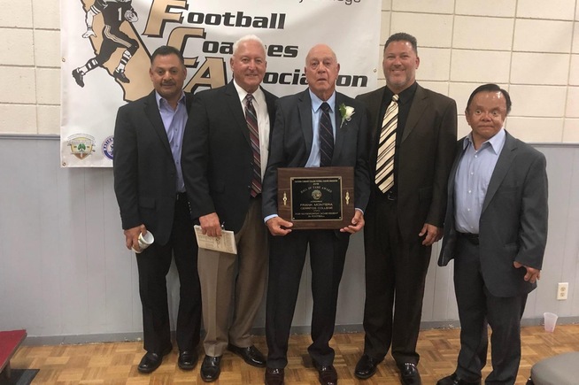 Frank Montera (center) is joined by (L-R) Cerritos equipment manager Refugio Estrada, head coach Frank Mazzotta, College of the Desert head football coach Casey Mazzotta and Cerritos team manager Richie Guataco