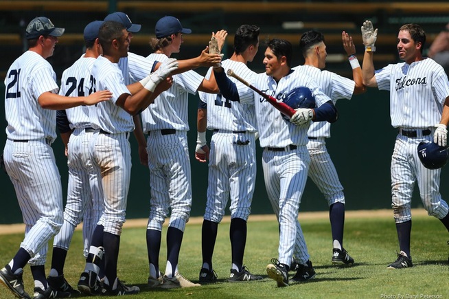 Teammates greet Ramon Bramasco after his grand slam
