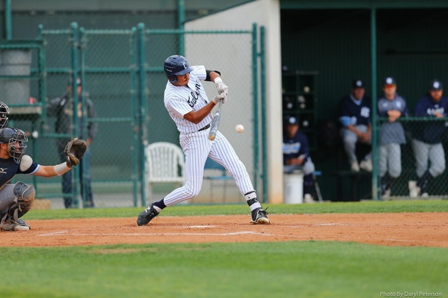 Michael Gonzalez hit a home run and walked in the Falcons loss