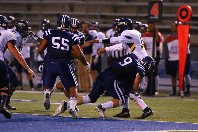 Alex Bush (9) named division's Defensive Player of the Year