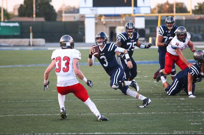 Nick Mitchell passed for 153 yards and rushed for 81 in the Falcons win