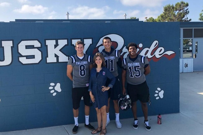 (L-R) Jacob Gasser, Isaiah Bravo and Tishawn Barnaby attended Hopkinson Elementary School on Monday to read to the kids.