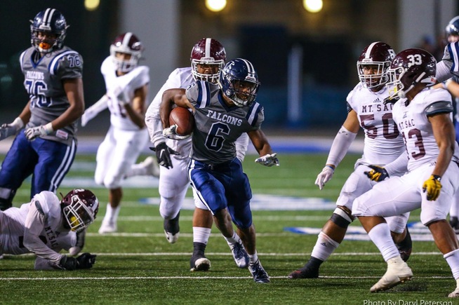 Jacobi Hardy scoots through the Mountie defense for some of his 62 rushing yards