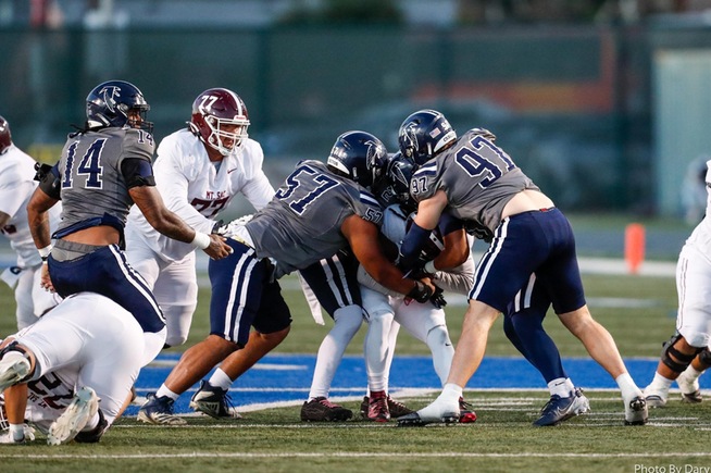 Leroy Palu (57) was named All-American, while he and Adam Tomczyk (97) were both All-State selections