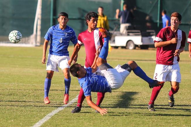 Saratiel Campos (11) attempts a bicycle kick in the Falcons scoreless game against Compton