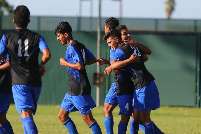 Falcons celebrate after Austin DeMedeiros (21) tied the game against Mt. SAC