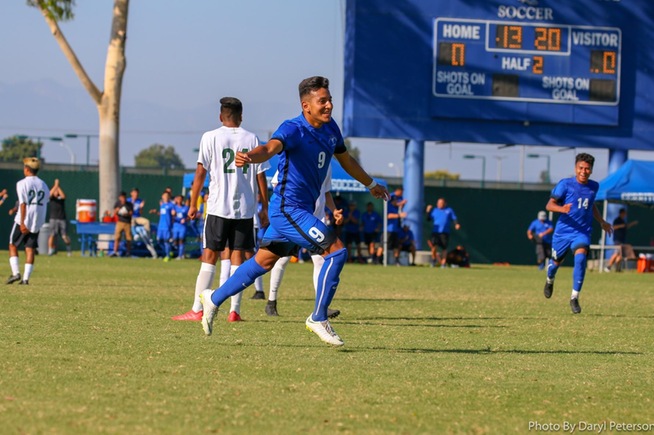 Kevin Diaz (9) celebrates after scoring the eventual game-winning goal