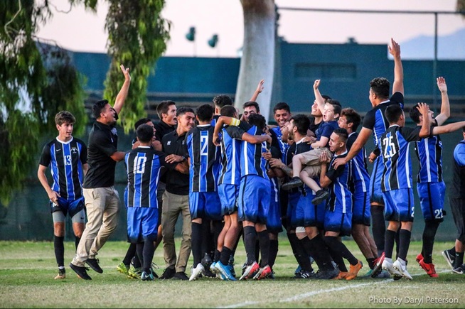 The Falcons celebrate after advancing in the conference tournament on penalty kicks