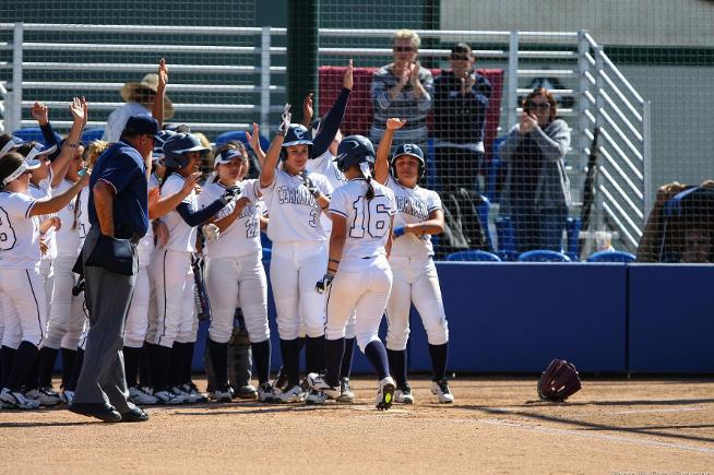 Kylee Brown (16) hit a first inning grand slam to lead the Falcons