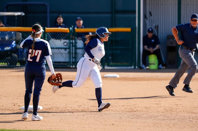 Maddy Guillen trots around the bases after her home run