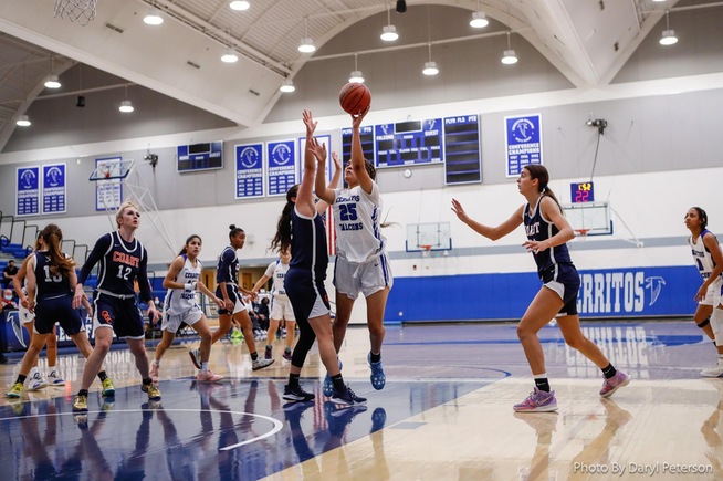 Therese Zekajj (25) converts a put-back for the Falcons in their win
