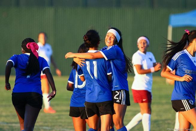 File Photo Caro Jaramillo (11) and Amber Whitmore (21) each scored twice in a 4-0 win