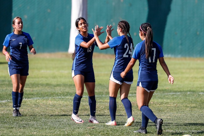 Ariana Rivera (24) celebrates with teammates after one of her two goals on the day