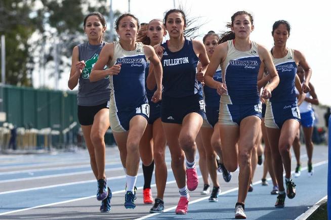 Ariel Melendez (L) and Janet Salazar (R) came in third and fourth place in the 1500 meters
