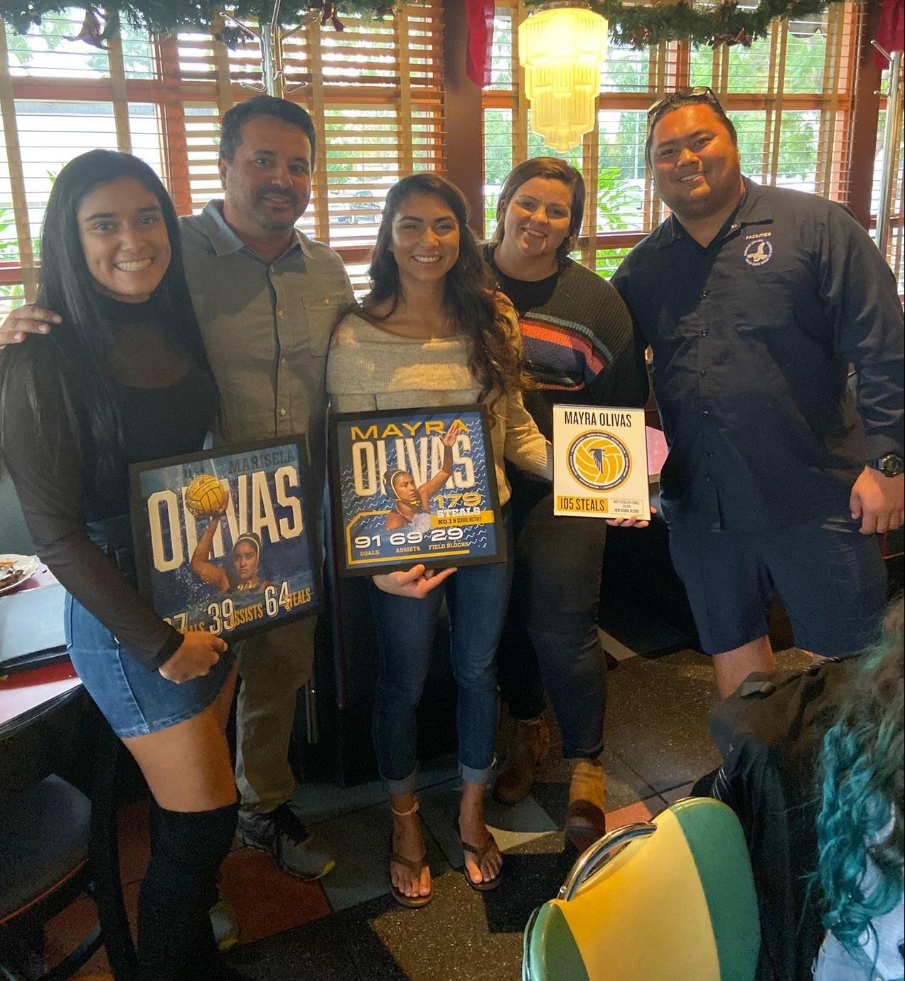 (L-R) Marisela Olivas, head coach Sergio Macias, Mayra Olivas, assistant coach Catie Tuning and Joe Joson help present postseason awards